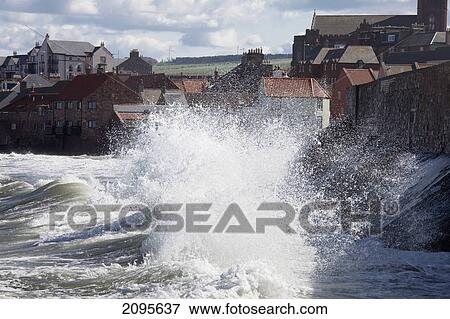 Waves Crashing Against The Shore; Dunbar Scottish Borders Scotland View Large Photo Image Stock Photo - Waves Crashing Against The Shore; Dunbar Scottish Borders Scotland. Fotosearch