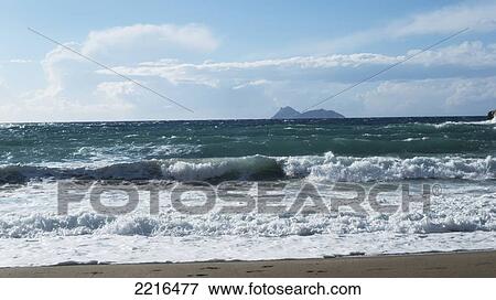 Stock Photo - Waves Crashing To Shore On Matalan Beach, Matalan, Crete, Greece. Fotosearch
