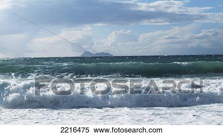 Waves Crashing To Shore On Matalan Beach, Matalan, Crete, Greece View Large Photo Image Stock Photography - Waves Crashing To Shore On Matalan Beach, Matalan, Crete, Greece. Fotosearch