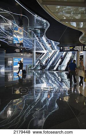 Wavy Lights On A Ceiling Reflected On A Glossy Floor In An Airport; Montreal Quebec Canada View Large Photo Image Stock Photo - Wavy Lights On A Ceiling Reflected On A Glossy Floor In An Airport; Montreal Quebec Canada. Fotosearch