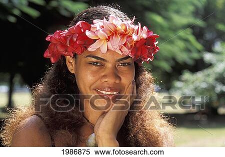Wearing flower Haku; Fiji, Beautiful young local woman with hand on chin View Large Photo Image Stock Photography - Wearing flower Haku; Fiji, Beautiful young local woman with hand on chin. Fotosearch