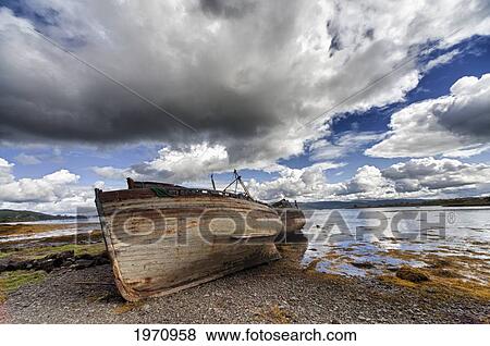 Stock Photo - Weathered Boats Abandoned At The Water's Edge; Salem Isle Of Mull Scotland. Fotosearch