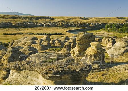 Weathered Landscape, Writing On Stone Provincial Park, Alberta View Large Photo Image Stock Photo - Weathered Landscape, Writing On Stone Provincial Park, Alberta. Fotosearch