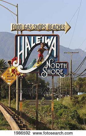 Stock Image - Welcome sign for the town of Haleiwa; Oahu, Hawaii, United States of America. Fotosearch