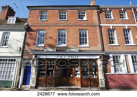 Stock Photo - Wells Bookshop in the old town of Kingsgate; Winchester, Hampshire, England. Fotosearch