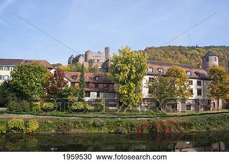 Stock Image - Wertheim Castle And Old Court Reflected In The Tauber River, Wertheim Am Main, Baden-Wurttemberg, Germany. Fotosearch