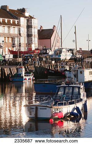 Stock Photo - West Bay Harbor On Jurassic Coast, South West Coast Path, Near Bridport; Dorset, England, Uk. Fotosearch