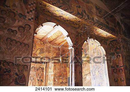 Stock Image - West wall and view into the narthex, Abreha wa Atsbeha rock cut church; Gheralta, Tigray region, Ethiopia. Fotosearch