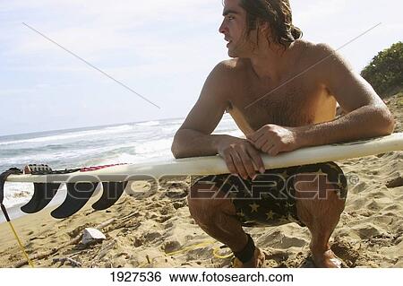 Stock Photograph - Wet Surfer. Fotosearch