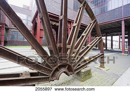 Wheel In The Circulating Plant Of Shaft 12 In The Zollverein Coal Mine Industrial Complex, Essen, North Rhine-Westphalia, Germany View Large Photo Image Stock Photo - Wheel In The Circulating Plant Of Shaft 12 In The Zollverein Coal Mine Industrial Complex, Essen, North Rhine-Westphalia, Germany. Fotosearch