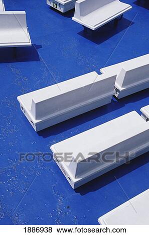Stock Photo - White Benches On Blue Floored Ferry. Fotosearch