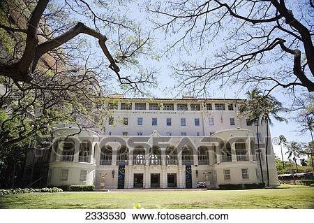 Stock Image - White building with numerous windows; Honolulu, Oahu, Hawaii, United States of America. Fotosearch