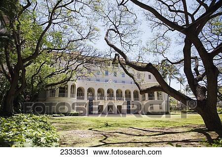 Stock Image - White building with numerous windows; Honolulu, Oahu, Hawaii, United States of America. Fotosearch