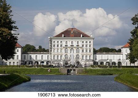 Stock Image - White Castle And A Canal; Munich, Germany. Fotosearch