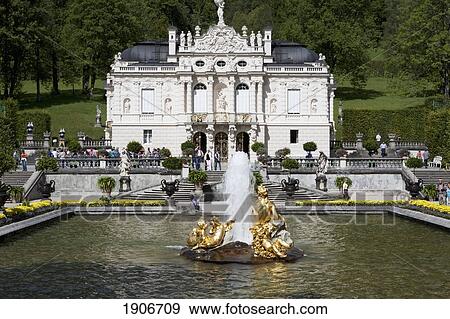 Stock Photo - White Castle With A Gold Fountain In A Pond; Linderhof, Germany. Fotosearch