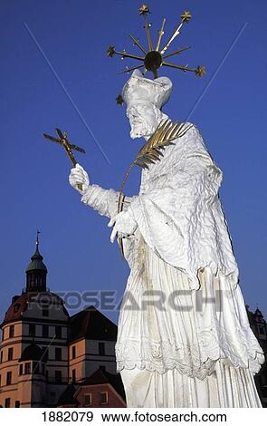 Stock Photo - White Christian Statue In Town Square. Fotosearch