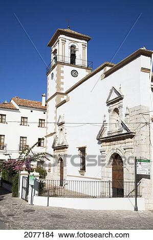 White Church Building With A Clock And Cross On A Tower Against A Blue Sky; Grazalema Andalusia Spain View Large Photo Image Picture - White Church Building With A Clock And Cross On A Tower Against A Blue Sky; Grazalema Andalusia Spain. Fotosearch
