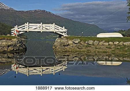 Stock Photo - White Footbridge Over Lake With Reflections. Fotosearch