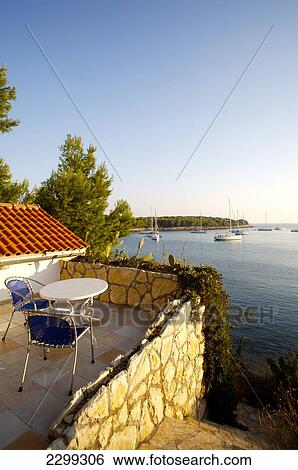 White house terrace; Palmizana, Sveti Klement, Croatia View Large Photo Image Stock Photograph - White house terrace; Palmizana, Sveti Klement, Croatia. Fotosearch