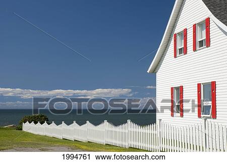 White House With Red Trim And A White Picket Fence By The Ocean; Gaspesie Quebec Canada View Large Photo Image Stock Image - White House With Red Trim And A White Picket Fence By The Ocean; Gaspesie Quebec Canada. Fotosearch
