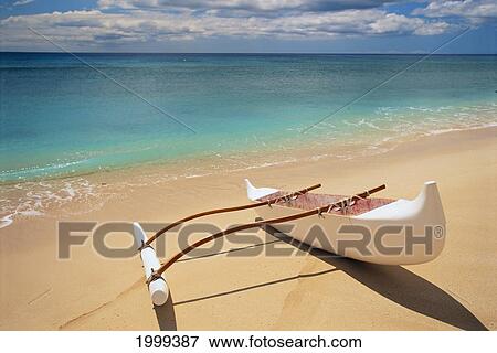 White Outrigger Canoe On Shoreline With Shadow, Calm Turquoise Water View Large Photo Image Stock Photo - White Outrigger Canoe On Shoreline With Shadow, Calm Turquoise Water. Fotosearch
