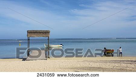 White sand beach along the coast of an island on the Indian Ocean; Mauritius View Large Photo Image Stock Photo - White sand beach along the coast of an island on the Indian Ocean; Mauritius. Fotosearch