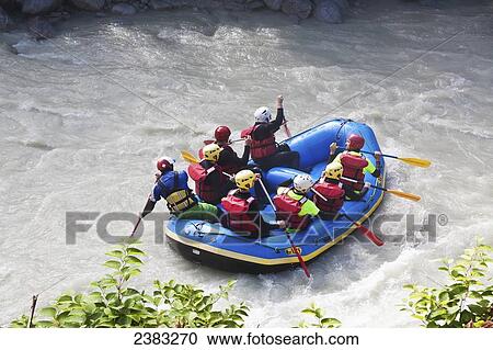 Stock Image - White water river rafting on L'Arve river in Chamonix-Mont Blanc valley; France. Fotosearch