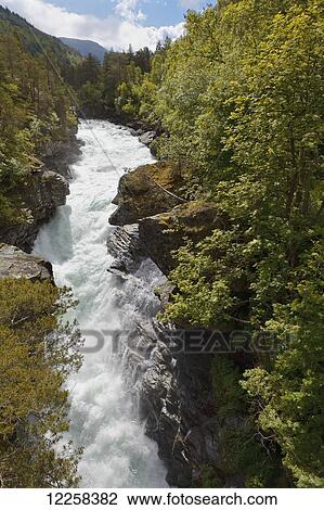 Stock Image - White water torrents at the Rauma Valley, near Andalsnes; Rauma, Norway. Fotosearch