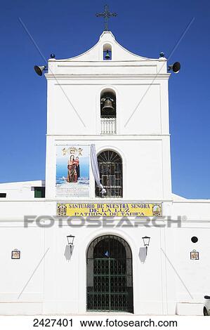 Stock Image - Whitewash church building with bell tower; Andalusia, Spain. Fotosearch