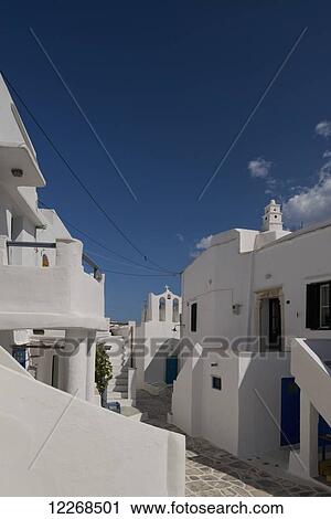 Stock Image - Whitewashed houses and narrow stone paths; Kastro, Sifnos, Cyclades, Greek Islands, Greece. Fotosearch