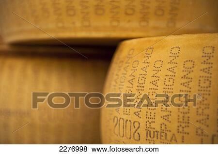 Whole parmesan cheeses for sale in Kaaskamer cheese shop, Amsterdam, Holland. View Large Photo Image Stock Photo - Whole parmesan cheeses for sale in Kaaskamer cheese shop, Amsterdam, Holland.. Fotosearch