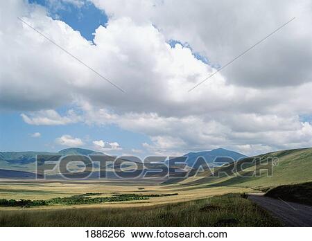 Stock Photograph - Wide Open Landscape In Ngorongoro Conservation Area. Fotosearch