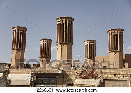 Wind towers (badgir) of water cistern; Yazd, Iran View Large Photo Image Stock Image - Wind towers (badgir) of water cistern; Yazd, Iran. Fotosearch