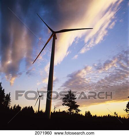 Stock Image - Wind Turbines And Clouds At Sunset, Saint-Leandre, Gaspe Coast, Quebec. Fotosearch