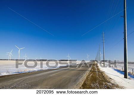 Wind Turbines And Hydro Lines Along Rural Road In Winter, Dufferin County, Ontario View Large Photo Image Stock Photography - Wind Turbines And Hydro Lines Along Rural Road In Winter, Dufferin County, Ontario. Fotosearch