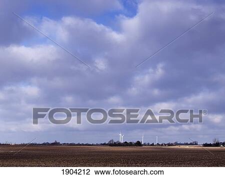 Windfarm In Cultivated Landscape, Denmark View Large Photo Image Stock Image - Windfarm In Cultivated Landscape, Denmark. Fotosearch