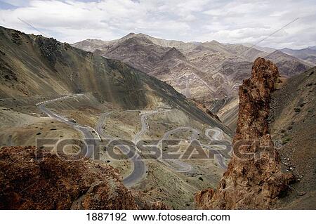 Stock Image - Winding Road In The Mountains, High Angle View. Fotosearch