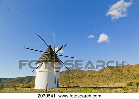 Windmill At La Boca De Los Frailes In Cabo De Gata-Nijar Natural Park; Almeria Province Spain View Large Photo Image Stock Image - Windmill At La Boca De Los Frailes In Cabo De Gata-Nijar Natural Park; Almeria Province Spain. Fotosearch