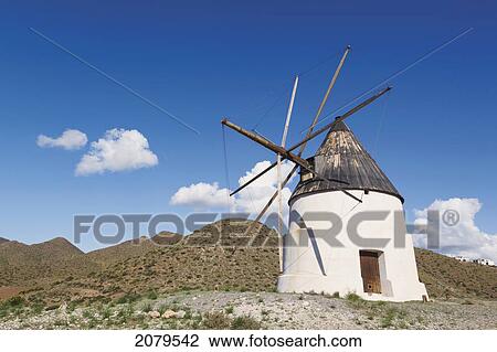 Windmill Just Outside San Jose In Cabo De Gata-Nijar Natural Park; Almeria Province Spain View Large Photo Image Stock Image - Windmill Just Outside San Jose In Cabo De Gata-Nijar Natural Park; Almeria Province Spain. Fotosearch