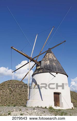 Stock Image - Windmill Just Outside San Jose In Cabo De Gata-Nijar Natural Park; Almeria Province Spain. Fotosearch