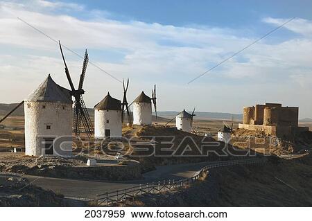 Windmills And Castle; Consuegra Toledo Province La Mancha Spain View Large Photo Image Stock Photo - Windmills And Castle; Consuegra Toledo Province La Mancha Spain. Fotosearch