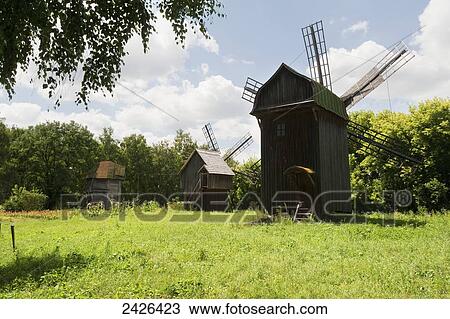 Stock Image - Windmills in a field; Kiev, Ukraine. Fotosearch