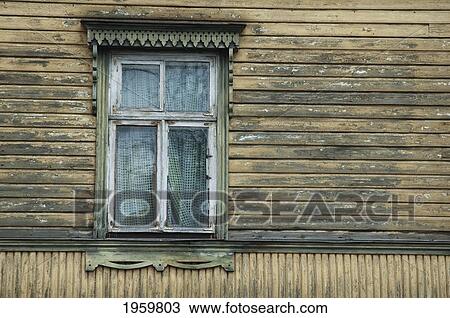 Stock Image - Window In A Wooden House At Tallinn, Estonia. Fotosearch