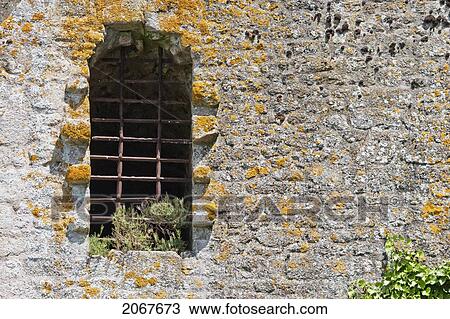 Stock Image - Window Of The Cellar Of The Abbey Of Mont-Saint-Michel, France. Fotosearch