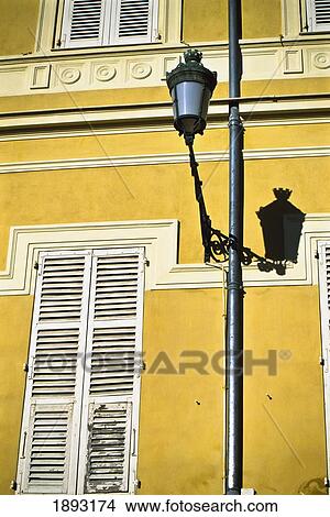 Picture - Window With Closed Shutters And Lamp Post, Close Up. Fotosearch