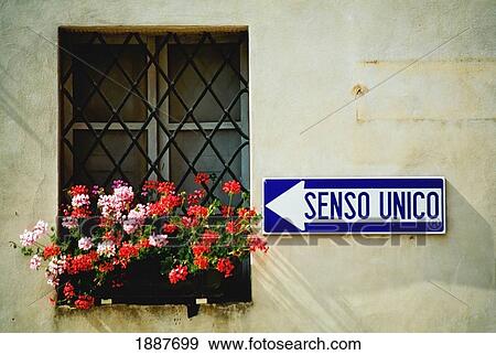 Stock Photo - Window With Geraniums And Sign. Fotosearch