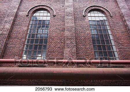 Windows In Administrative Building By Shaft 1/2/8 In The Zollverein Coal Mine Industrial Complex, Essen, North Rhine-Westphalia, Germany View Large Photo Image Stock Image - Windows In Administrative Building By Shaft 1/2/8 In The Zollverein Coal Mine Industrial Complex, Essen, North Rhine-Westphalia, Germany. Fotosearch