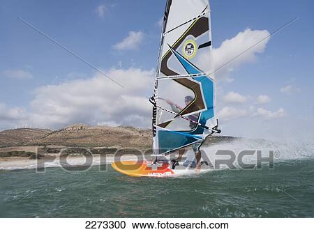 Windsurfer along the coast; tarifa cadiz andalusia spain View Large Photo Image Stock Image - Windsurfer along the coast; tarifa cadiz andalusia spain. Fotosearch