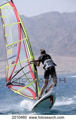 Stock Image - Windsurfing In Dahab, Egypt. The Resort On The Sinai Peninsular Has Become A Favourite Destination For Year Round Windsurfing.. Fotosearch
