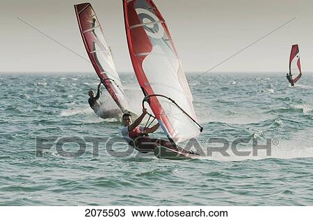 Stock Image - Windsurfing; Tarifa Cadiz Andalusia Spain. Fotosearch